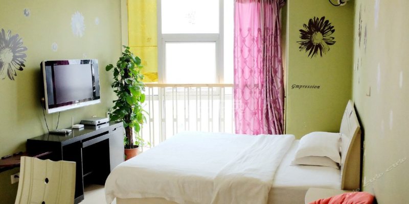 馨怡阁酒店公寓2297439卧室图1