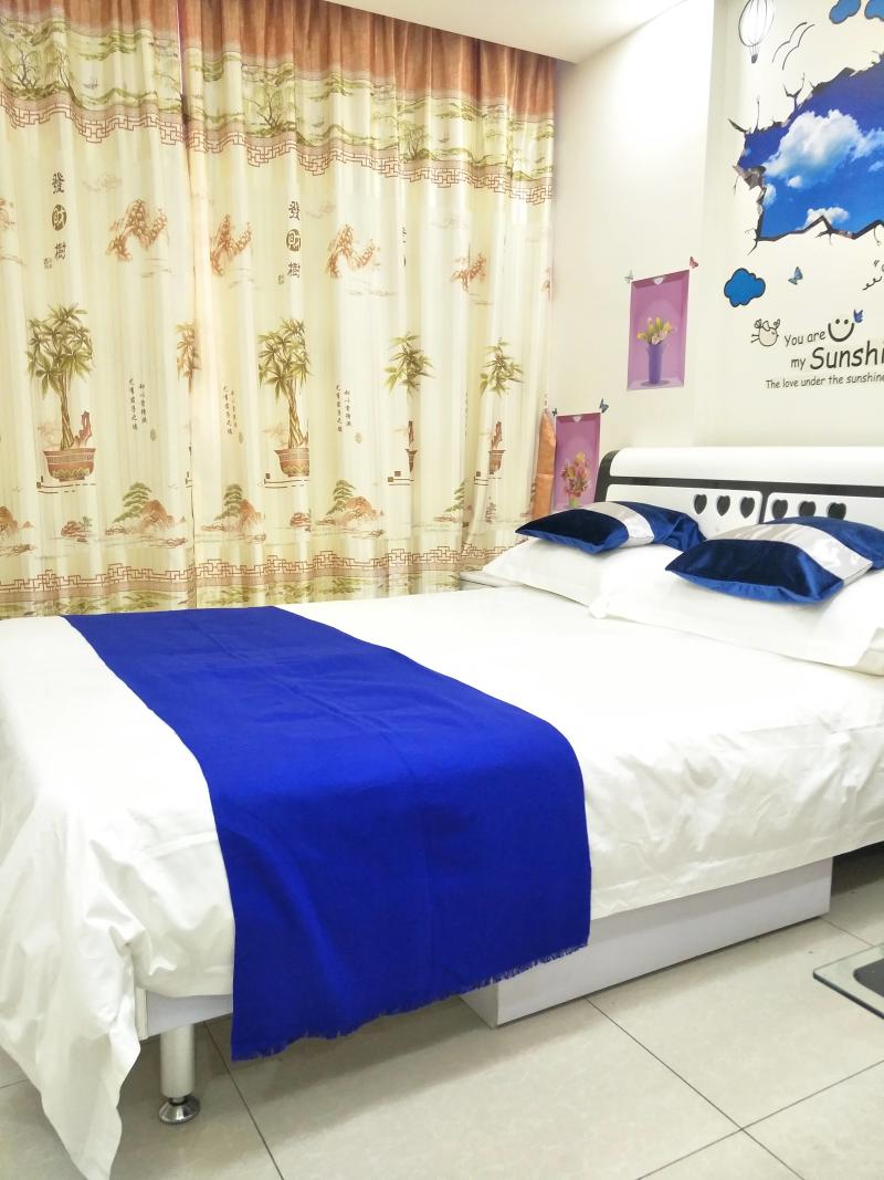 圆达温馨公寓4800090卧室图2