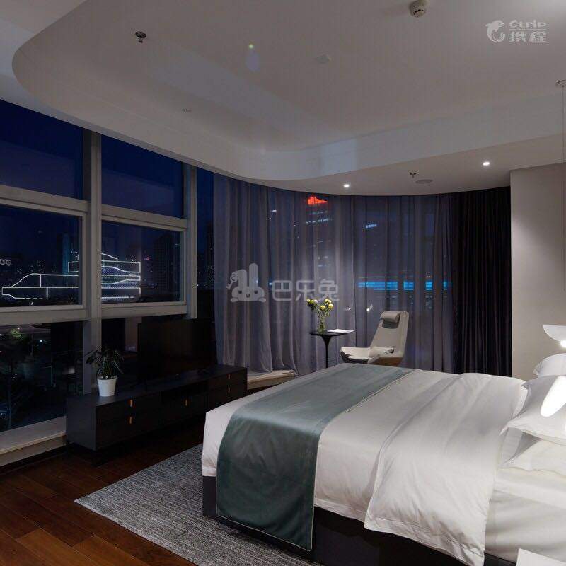 组歌酒店式公寓（金泊湾店）4925641卧室图0