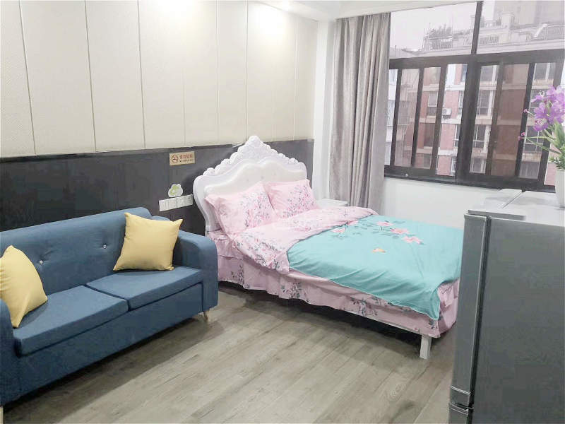 龙之心公寓恒8店6536389卧室图1