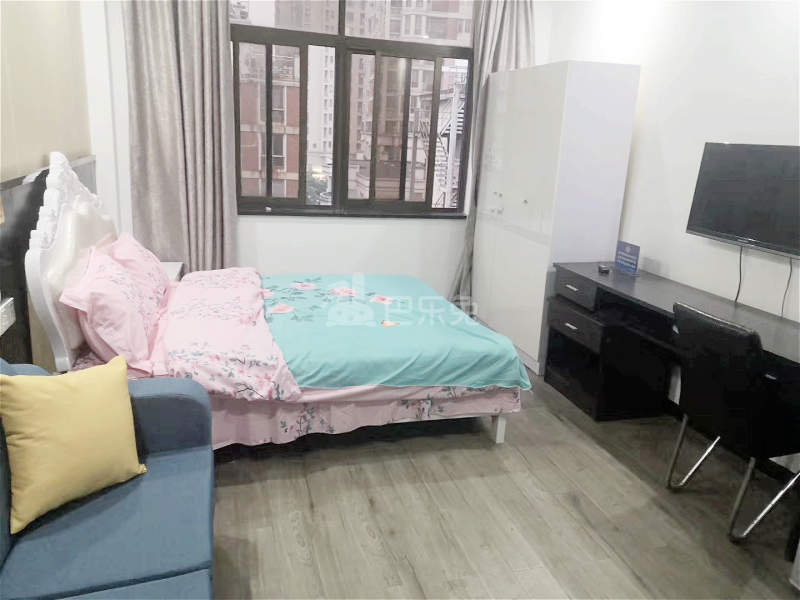 龙之心公寓恒8店6536389卧室图2