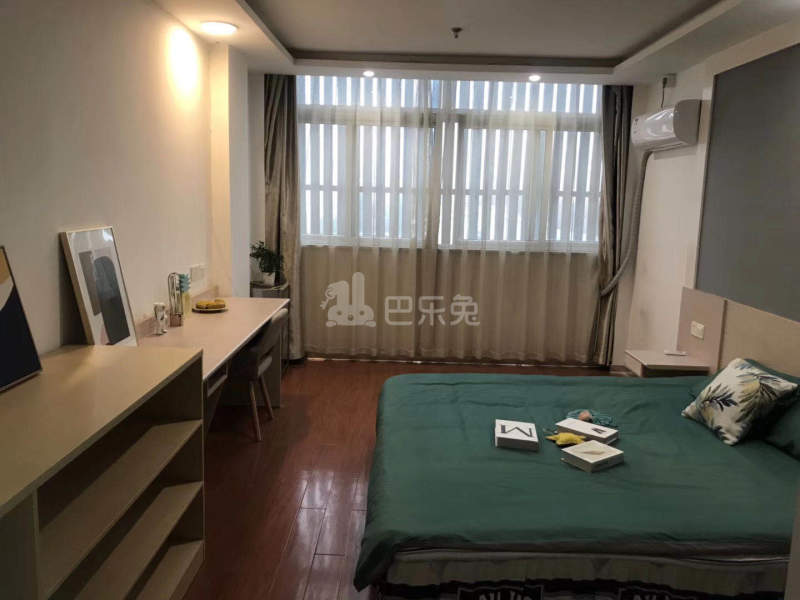 乐柚公寓益乐店6713443卧室图3