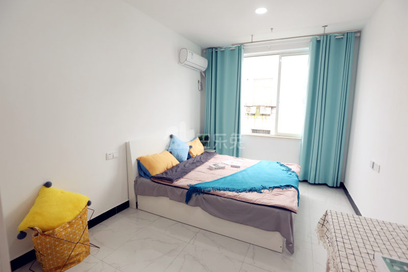 壹家公寓新惠名苑店7330171卧室图1