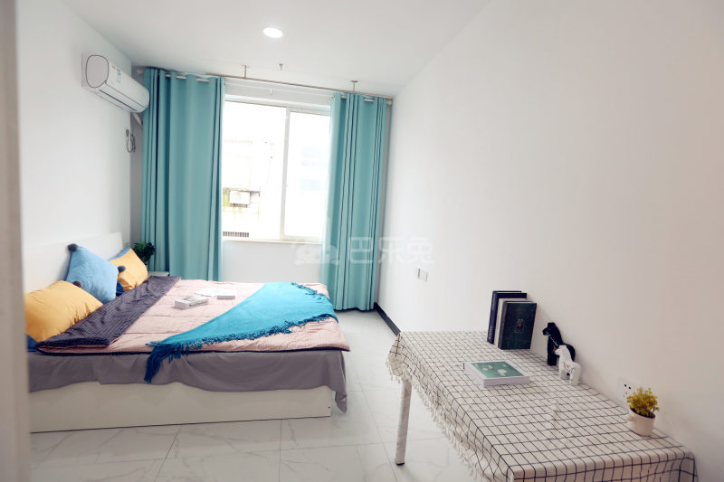 壹家公寓新惠名苑店7330171卧室图3