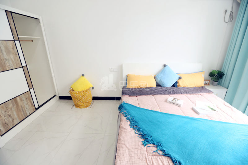 壹家公寓新惠名苑店7330171卧室图4