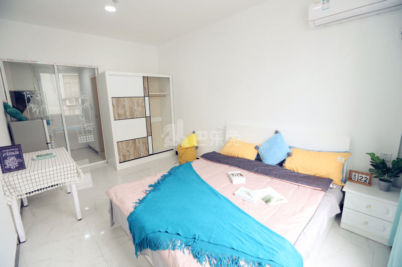 壹家公寓新惠名苑店7330171卧室图5