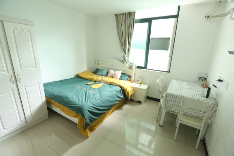 壹家公寓新华广场店7342214卧室图0