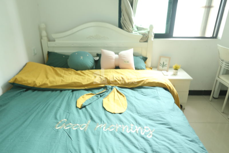 壹家公寓新华广场店7342214卧室图2