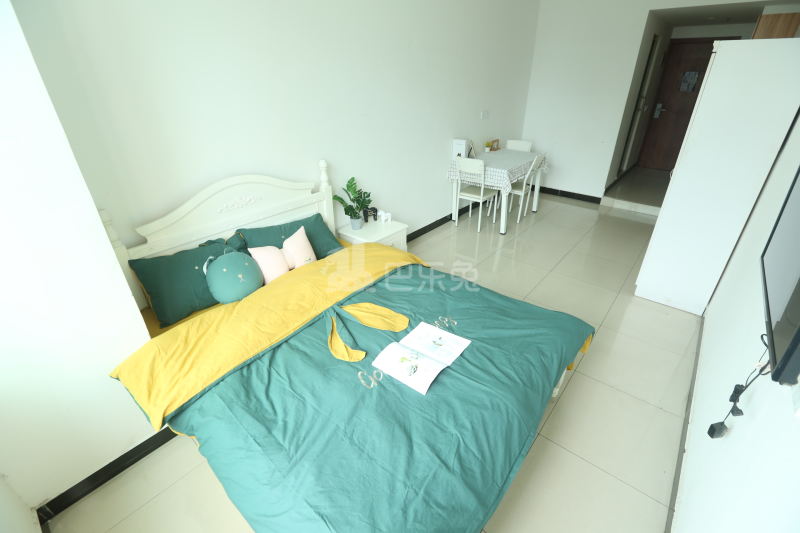 壹家公寓新华广场店7342224卧室图1