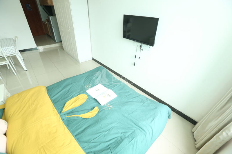 壹家公寓新华广场店7342224卧室图2