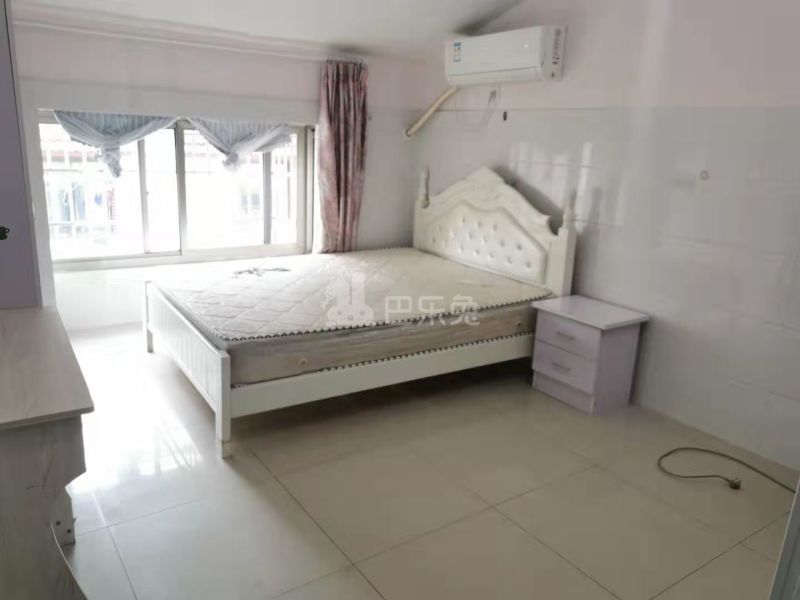 榴莲公寓（二联家园店）7533811卧室图2