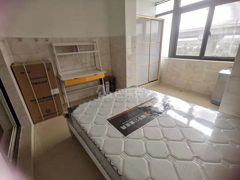 榴莲公寓（二联家园店）7865502卧室图3