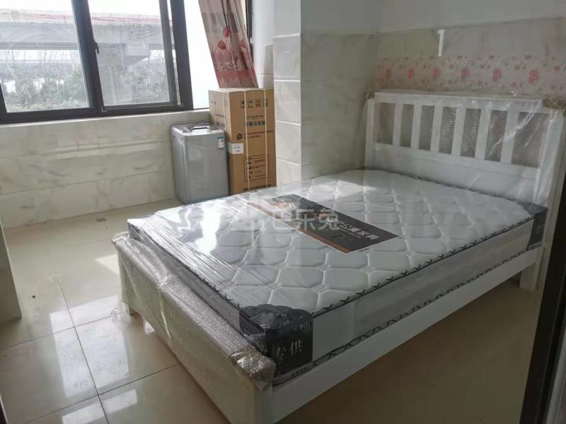 榴莲公寓（二联家园店）7865502卧室图2