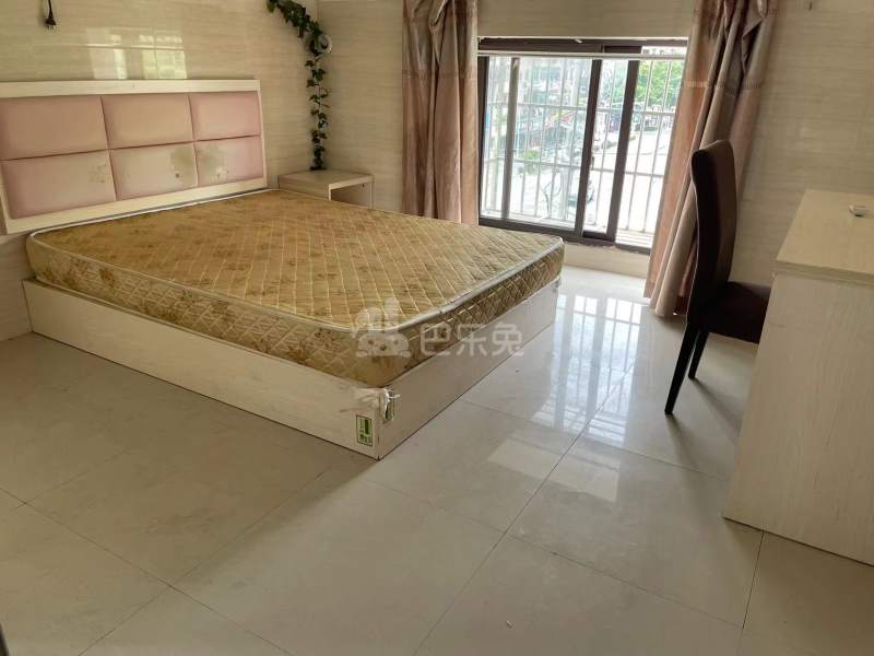 榴莲公寓（二联家园店）8589041卧室图2